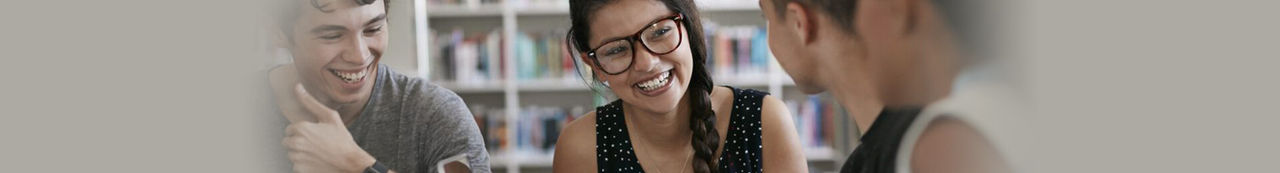 Students sitting in library talking
